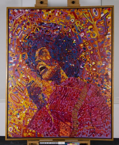 Revolutionary (Angela Davis) by Wadsworth Jarrell is an artwork that both dominates a room and rewar