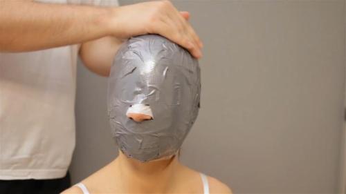 Wrapped Female Faces