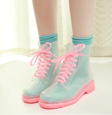 transparent boots with colorful detail. comes in pink, yellow, orange, blue and green! buy them here