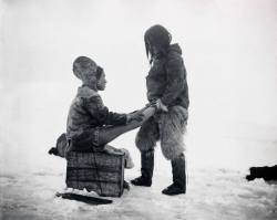 talapishka:   An Inuit man warms his wife’s