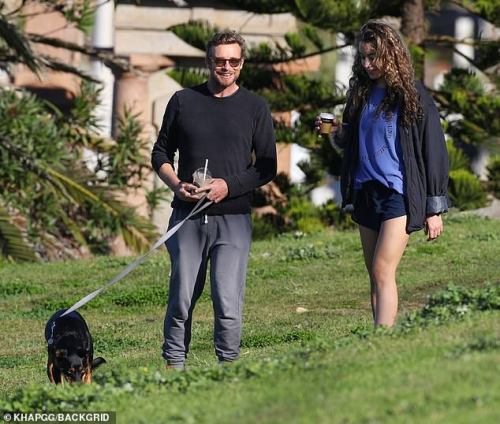 Simon with his daughter Stella walking his dog in Sydney, june 14 2020