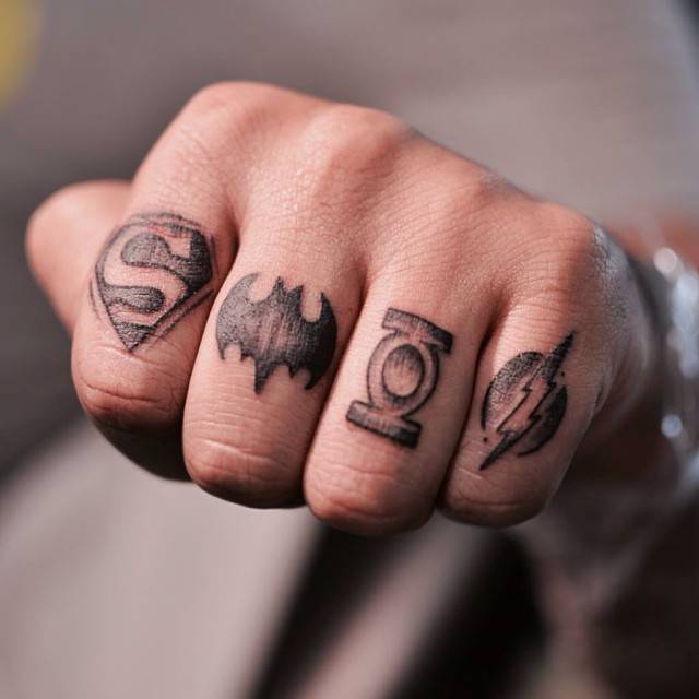 knuckle tattoos of the logos of Superman, Batman,... - Official Tumblr page  for Tattoofilter for Men and Women