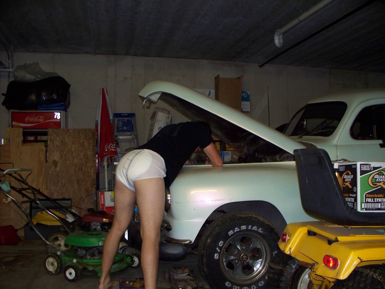 diaperedrock:Why not work on a car and wear a diaper at the same time.  VERY sexy