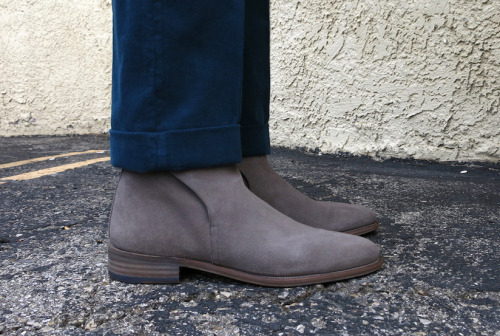 Streetwear and menswear mashup:  dress shirt and trousers with trucker jacket and Jodhpur boots