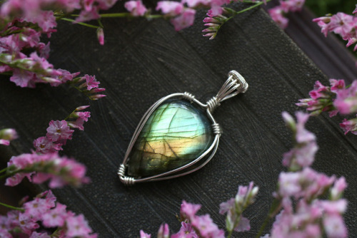 All these beautiful wire wrapped sterling silver labradorite pendants are available at my Etsy Shop 