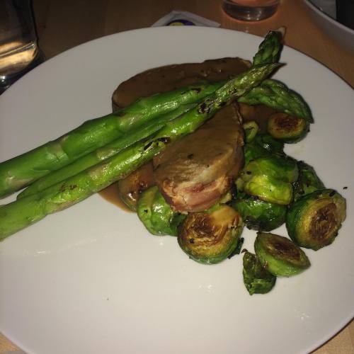 irrelephantlybeautiful: Bacon wrapped boat meatloaf with asparagus and busses sprouts @blueduckphill