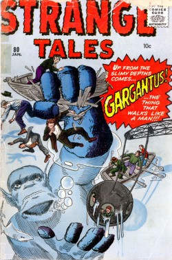 comicbookcovers:  Strange Tales  Strange tales indeed.  Just why are all those dudes in suits standing on a cliff with guns, pitchforks, and what look like bats or clubs to fight the big dragon/monkey/lizard thing?