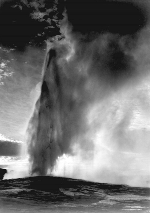 Old Faithful at low lightIn 1941, nature photographer Ansel Adams traveled through a number of natio