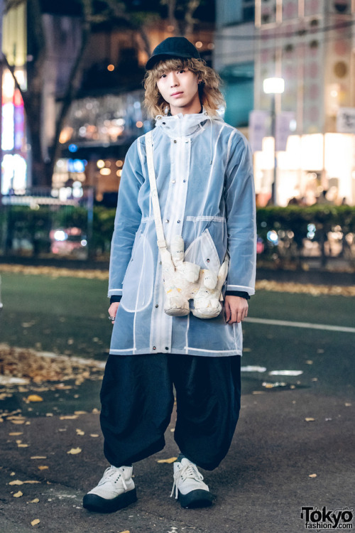 Japanese fashion college student Saga on the street in Harajuku wearing a sheer jacket from Dog Hara