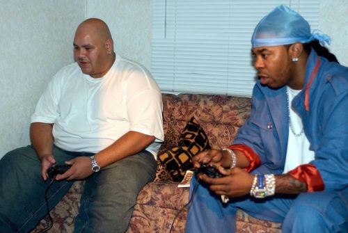 gutsanduppercuts:  Fat Joe and Busta Rhymes playing Playstation, back in 2000.