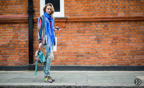 Victoria Jett in Gucci blazers and denim with iPhone 6 Plus wearing red cover