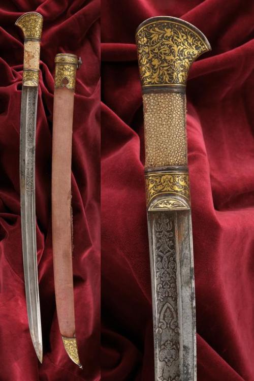 Gold inlaid hunting dagger from Russia, dated 1891.from Czerny’s International Auction House