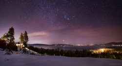 space-pics:  Vibrant winter stars over Lake Tahoe, a week ago. That’s Sirius’s bright reflection on the water! [oc][3000x1633]http://space-pics.tumblr.com/