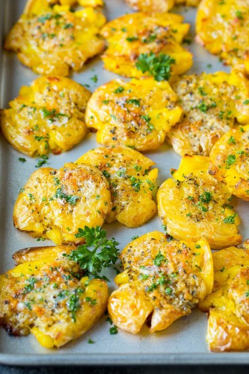 Smashed potatoes with garlic and herbs