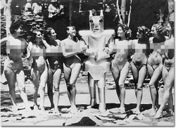 cracked:  What, you thought robot porn was invented in Internet-era Japan? That picture up there is from 1935, bitches. We bet you didn’t think they even had robots back then.This is in fact a picture of some guy dressed up as Alpha the Robot, a popular