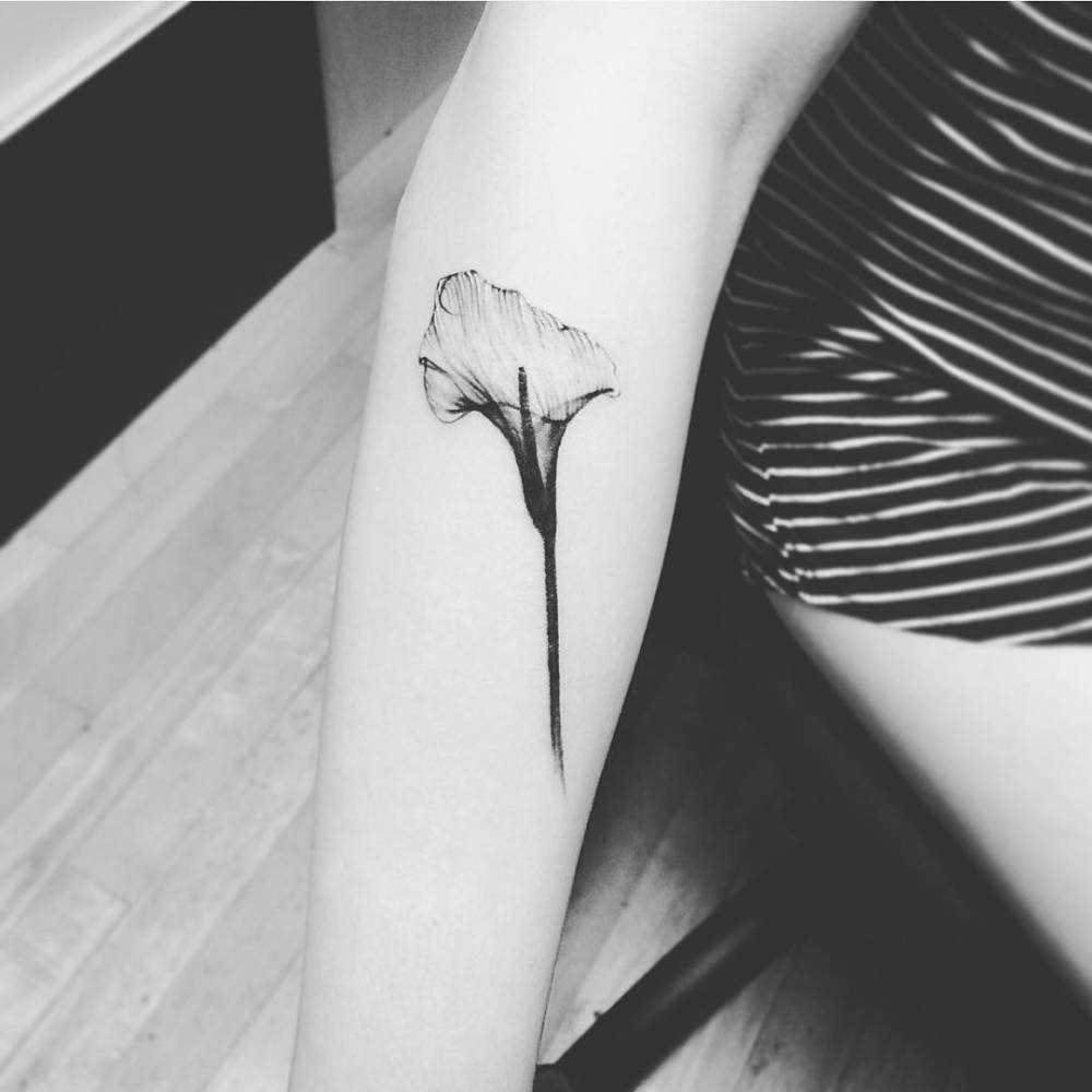 Unlock the Hidden Meaning Behind Calla Lily Tattoos Symbolic Significance  Explained  Impeccable Nest