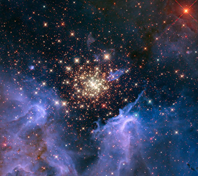 Starburst Cluster showing Celestial Fireworks.
Credit: NASA, ESA, R O'Connell, F Paresce, E Young