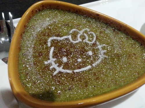 So I went to a Hello Kitty Cafe and guys this is a matcha Creme Brulee. That cookie…is matcha shortb