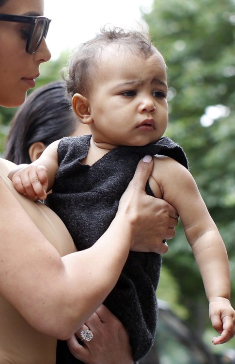 kxrdashjenner:  May 20, 2014 - Kim and North arriving at a Givenchy store in Paris. 