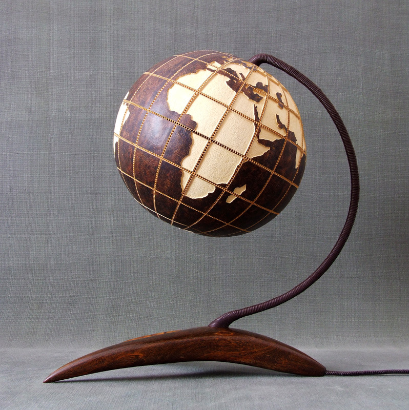 psychoactivelectricity:  This lamp is made of Senegalese gourd.   Meridians and circles
