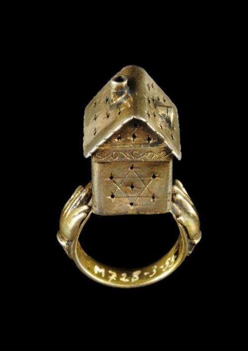 ir-hakodesh:Two wedding rings surmounted by a symbolic structure in the form of a house 1. Italy, 18