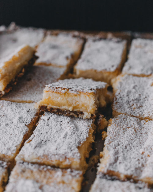 sweetoothgirl: Lemon Bar Cheesecake Squares with Biscoff Cookie Crust