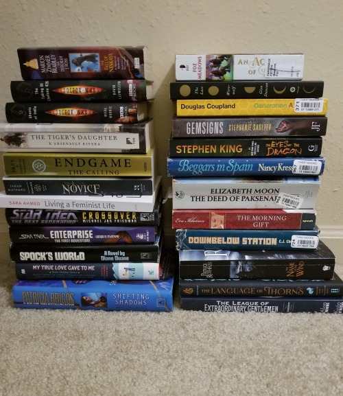 my tbr pile (left) was not too bad and then my mom visited and brought a bunch of my books from home