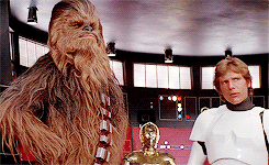 carriefishers-archive:  Han turns to his companion, CHEWBACCA, an eight foot tall, savage-looking creature resembling a huge gray bush-baby monkey with fierce “baboon”-like fangs.  His large yellow eyes dominate a fur-covered face and soften his
