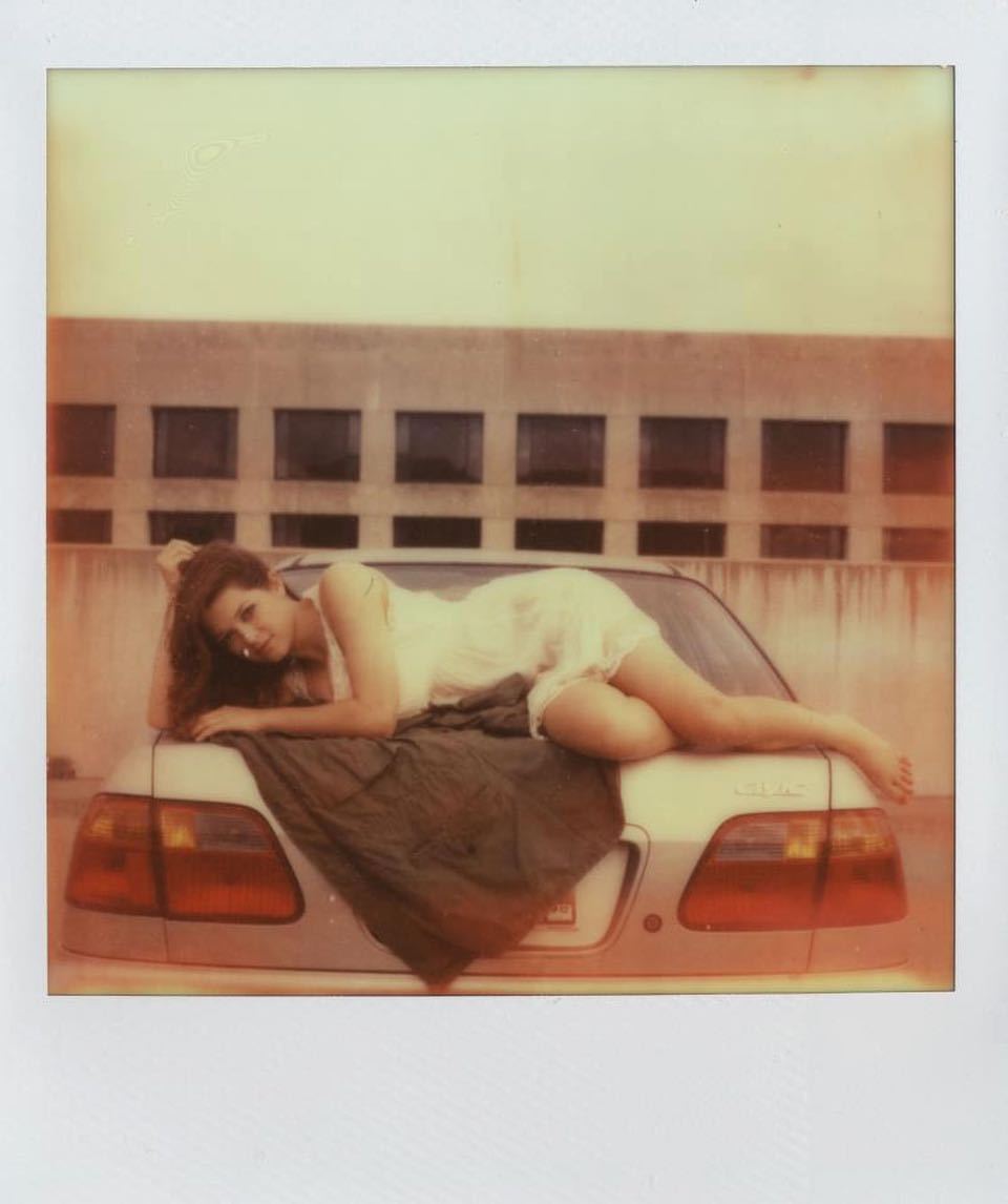 After I took a Polaroid on the back of this Civic I sent a telegram to my friends