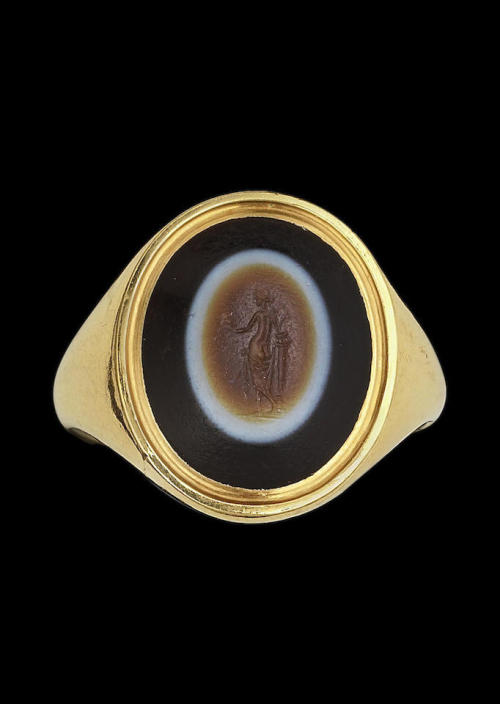 ancientjewels:Banded agate Roman intaglio, c. 1st or 2nd centuries CE. Ring setting is modern. From 