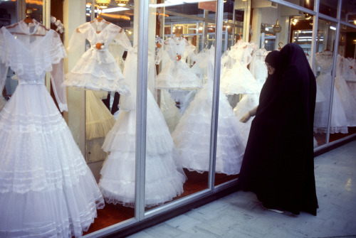 unrar:



Wedding shop in the centre of the city,Tehran 1987, Jean Gaumy. 