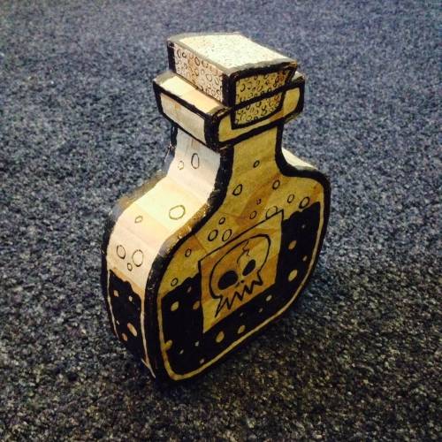 And some still shots of the cardboard poison bottle.