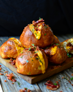 foodfuckery:  Cheddar Bacon Stuffed Pretzel Buns Recipe    