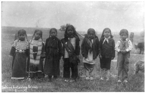 Native children going to school… So sad.