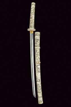 art-of-swords:  Katana SwordDated: 19th centuryCulture: JapaneseMedium: steel, boneMeasurements: overall length 80.5 cm; blade length 54.5 cmTe blade features a pattern (hamon) with a not clearly visible ‘hada’, plus a brass habaki (a wedge shaped