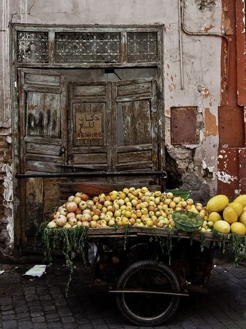 Selling fruits in the souk, Morocco.