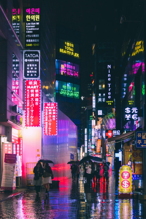 rjkoehler:Rain and neon-drenched night, Myeong-dong.