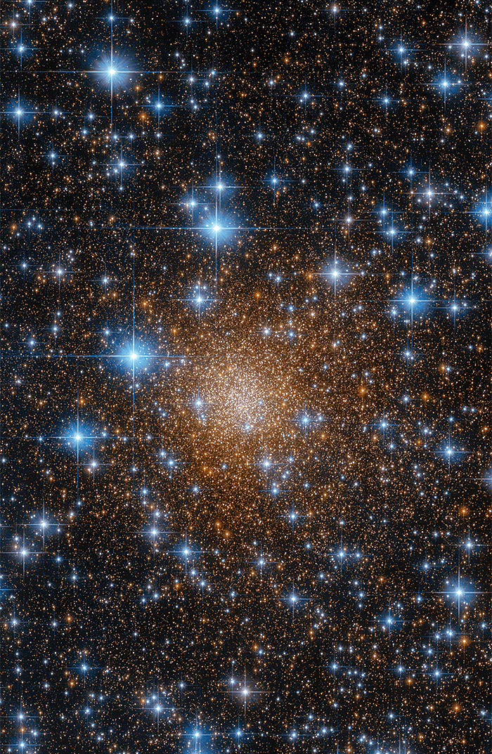 Globular cluster Liller 1 behind piercingly blue stars