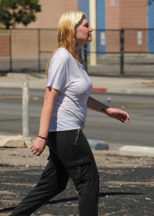 These are from the middle of this summer it was over 110 so she decided to start her own wet t-shirt contest. 