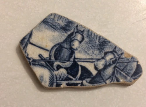 Horses on a fragment of broken plate.