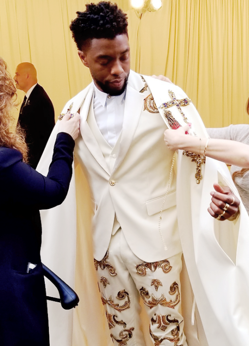 shaekingshitup:  audrey-hepbae:  wesleygasm: Chadwick Boseman getting ready to attend the Heavenly B