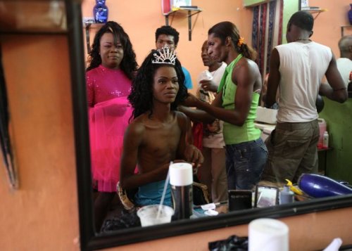 latino-diversity:Friends help a trans woman put on her makeup and costume before the festivities of San Pacho in Quibdó, Colombia