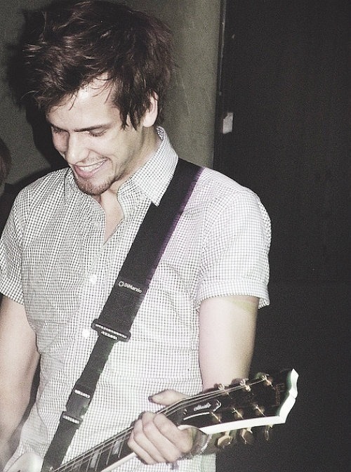 thekennedymaine:  Kennedy smiling while playing guitar 