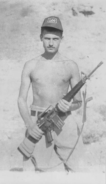 pattern-53-enfield:Vladimir Lebedenko of the 334th Detached Spetznaz Group with captured M-16 and ha