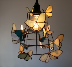 sosuperawesome:  Moth to a Flame LampNeile on EtsySee our #Etsy or #Stained Glass tags 