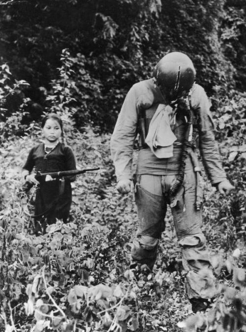 historicaltimes:US Air Force Pilot held captive by a North Vietnamese girl, 1967 via reddit