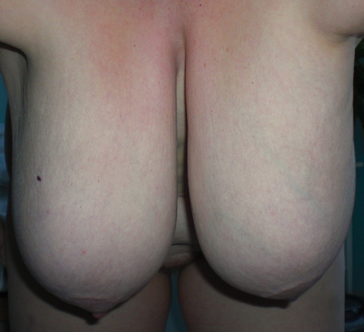 Isa from Belgium: my big tits bending and hanging low for you another great submission