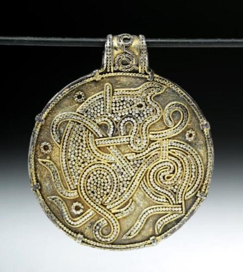Viking filigree gilded silver pendant, 10th-11th century.from Artemis Gallery