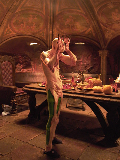 monsters-werewolves:  Doug Jones on the set of “Pan’s Labyrinth” as The Paleman.