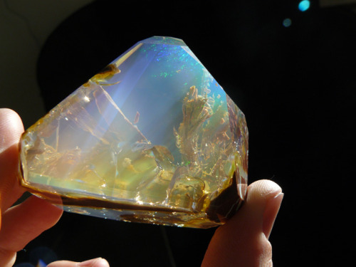 vazelodian:  Crystal Opal What makes the gemstone stunning is that it looks like an underwater view of the ocean floor as light shines through it. There’s a surreal quality about the gemstone that looks like a pocket-sized aquarium. The treasure is